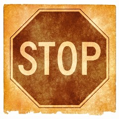 stockvault-stop-sign-grunge134010.jpg